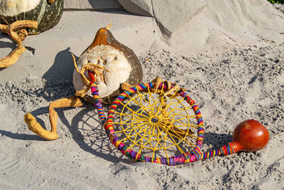 High angle view of toys on beach