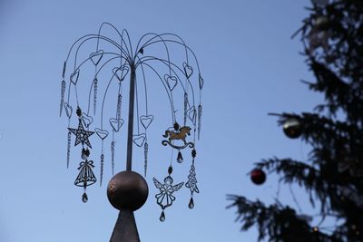 Low angle view of christmas decoration against sky