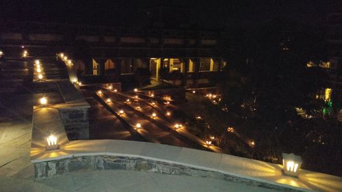 High angle view of illuminated street at night