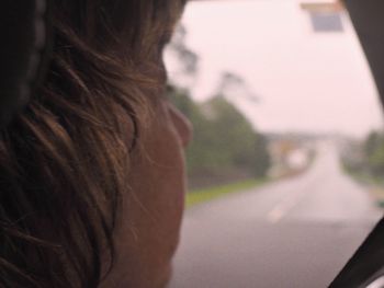 Rear view of woman with umbrella