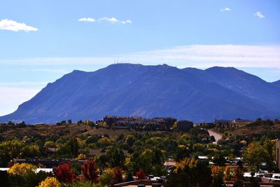 View of town against cloudy sky