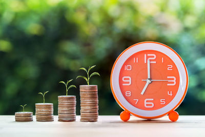 Close-up of clock on table