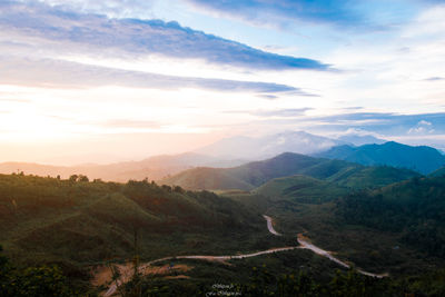 Scenic view of landscape against sky during sunset