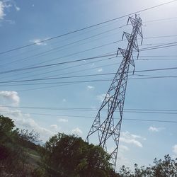 Low angle view of electricity pylon