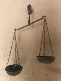 Close-up of clothes hanging on sand