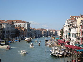 Boats moored in canal