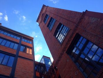 Low angle view of building against blue sky