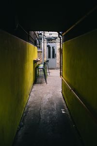 Empty alley amidst buildings