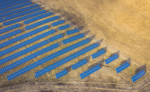Aerial view of solar panels on land
