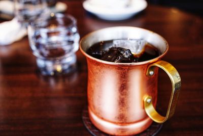 Close-up of coffee served on table
