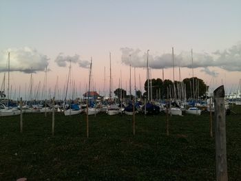 Boat in sea at sunset