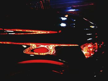 Low angle view of illuminated car at night