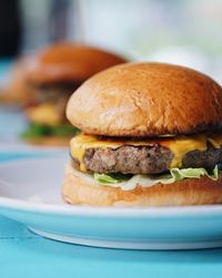 Close-up of burger in plate on table