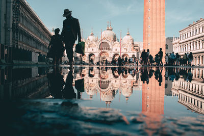Reflection of buildings in lake