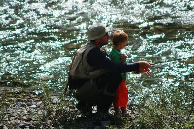 Full length of father and son