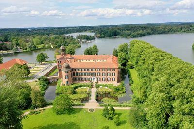 High angle view of plants by river against sky