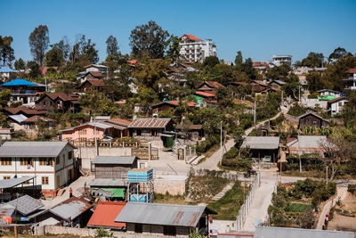 High angle view of townscape of kalaw against sky