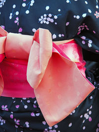 Rear view of woman wearing floral kimono