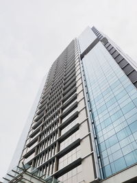 Low angle view of modern building against clear sky