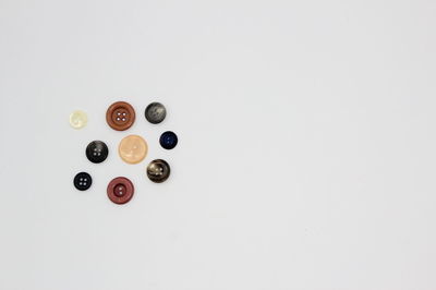 High angle view of balls on table against white background