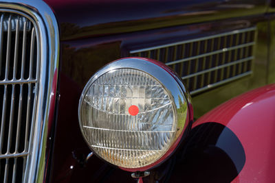 Close up of vintage car head light