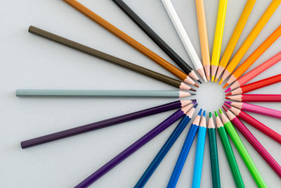 High angle view of multi colored pencils on table