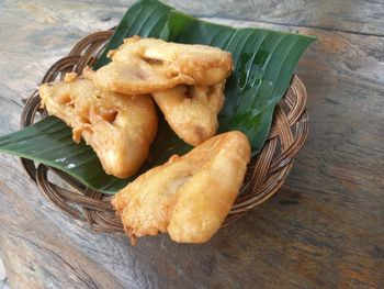 Fried banana on a traditional bamboo plate