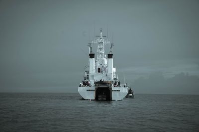 Ship in sea against sky