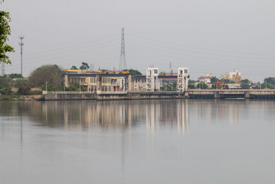 Bridge over river against clear sky