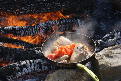 Close-up of meat on barbecue grill