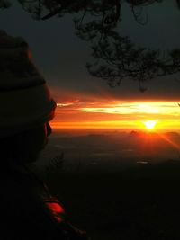 Scenic view of sunset over mountain