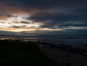 Scenic view of sea at sunset