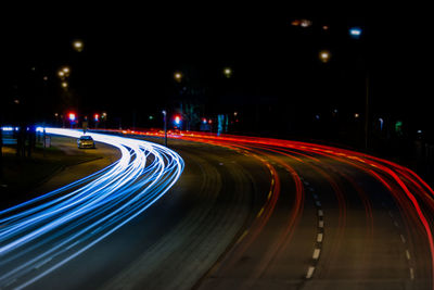 Light trails on road at night