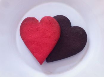 Close-up of heart shape over white background