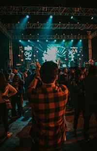 Rear view of people at music concert