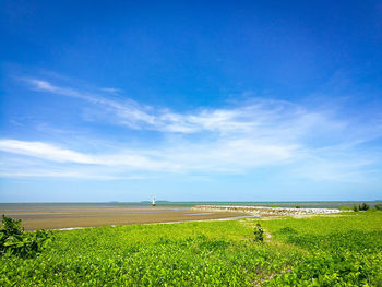 Scenic view of sea against cloudy sky