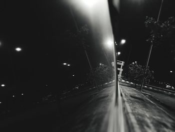 Illuminated road at night