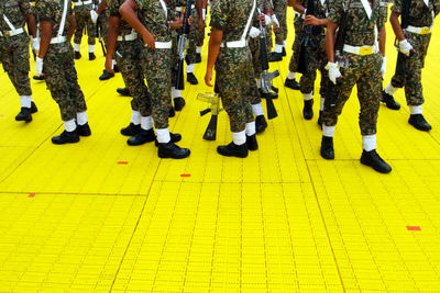 Low section of people on zebra crossing