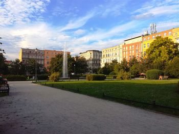 Park in city against sky