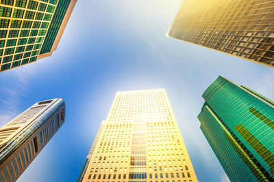 Low angle view of modern buildings against sky