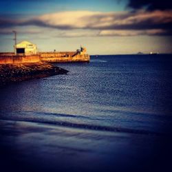 Scenic view of sea at sunset