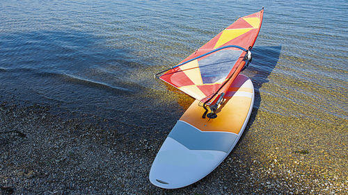 High angle view of ship moored on beach