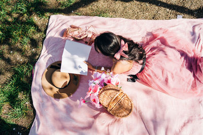 High angle view of women lying on floor