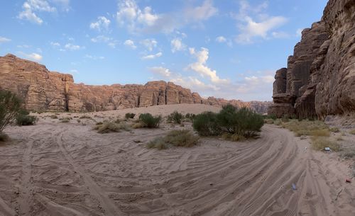 Panoramic view of desert against sky