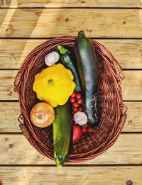 High angle view of fruits in basket on table