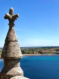 View of sea against blue sky