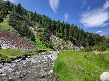 Scenic view of river against sky in livigno, italy