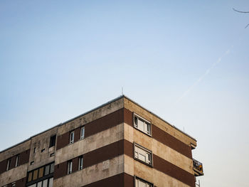 Low angle view of buildings against clear sky