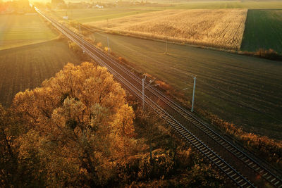 Aerial view of railway countryside landscape at sunset