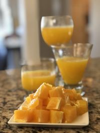 Close-up of yellow juice on table